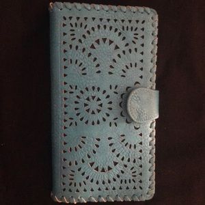 Woman’s large wallet color in Blue/Teal
